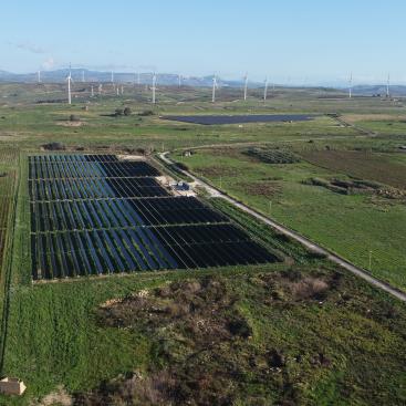 wind farm and solar pv in a field